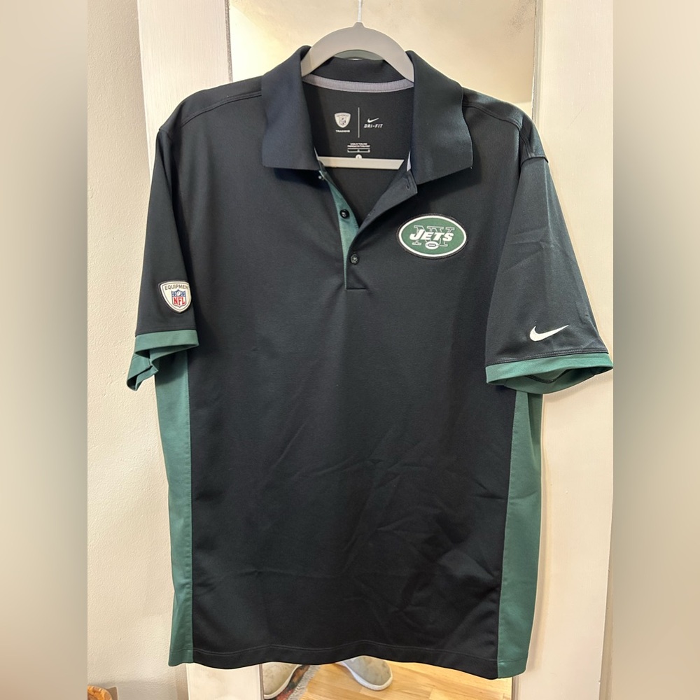Assorted Men’s active wear shirts with NY Jets logo.